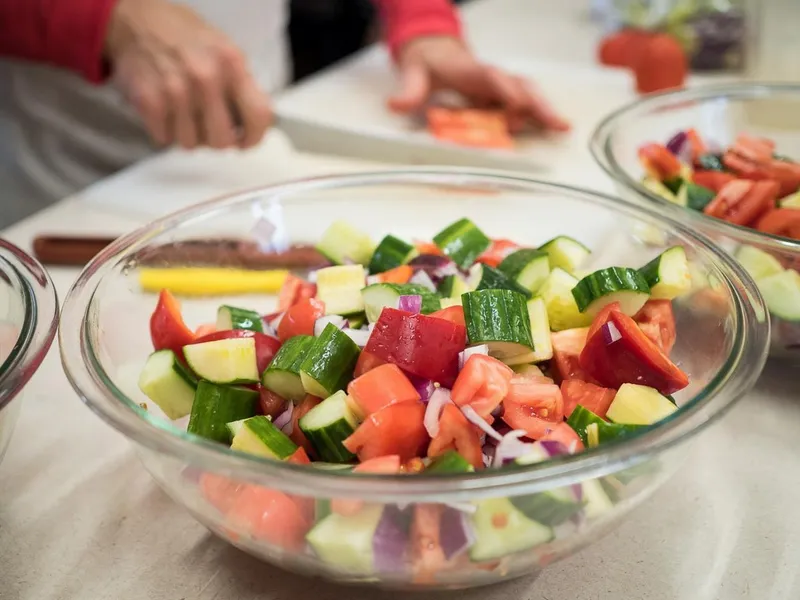 Hiking boots drying by propane heater