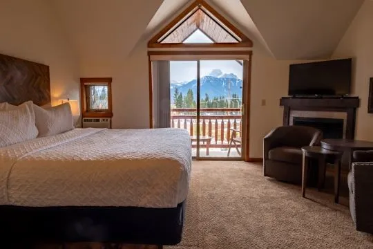 Cabin-inspired suite with mountain views